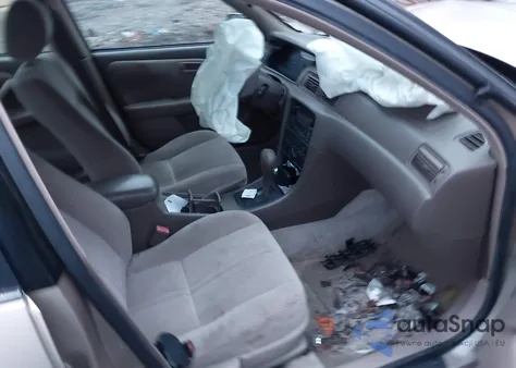 2000 Toyota Camry Le z USA, uszkodzony, nr VIN JT2BG22K8Y0437277